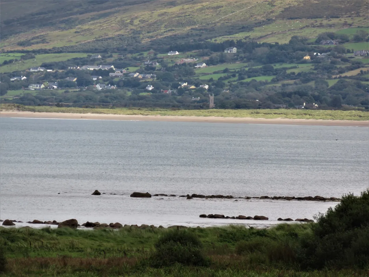Kilgobbin Church and churchyard overlooking Tralee Bay near Camp, County Kerry